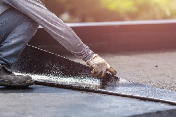 Professional Waterproofing technician working in Glen Echo, MD